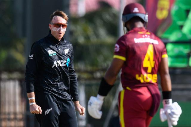 Jayden Lennox (L) of New Zealand celebrates the dismissal of Shai Hope (R) of West Indies during the second one-day international (ODI) cricket match between West Indies and New Zealand at Guyana National Stadium in Providence, Guyana on July 13, 2026. (Photo by Randy Brooks / AFP)