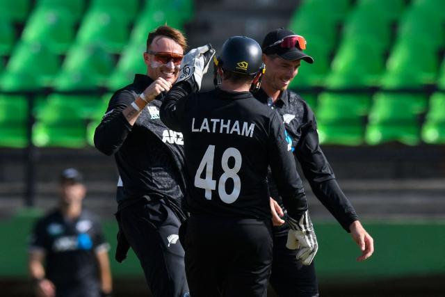 Jayden Lennox (L) and Mitchell Santner (R) of New Zealand celebrates the dismissal of Shai Hope (unseen) of West Indies during the second one-day international (ODI) cricket match between West Indies and New Zealand at Guyana National Stadium in Providence, Guyana on July 13, 2026. (Photo by Randy Brooks / AFP)