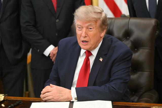 US President Donald Trump speaks before signing an executive order to drastically shrink two national monuments in Utah, paving the way for fossil fuel extraction and mining. (Photo by SAUL LOEB / AFP)