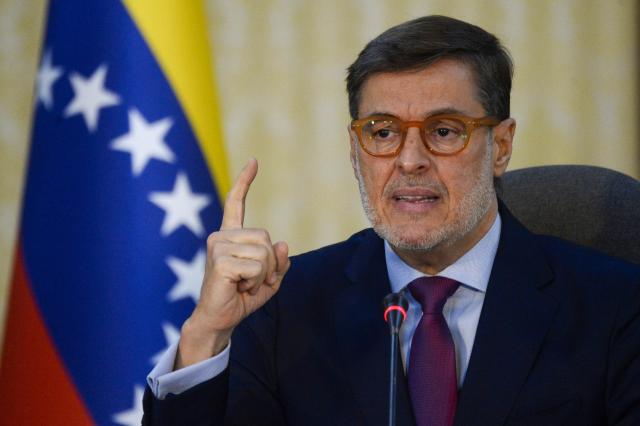 (FILES) Venezuelan Foreign Minister Felix Plasencia offers a press conference at the Foreign Ministry in Casa Amarilla Palace in Caracas, on January 19, 2022. Venezuela's interim president Delcy Rodriguez named a new foreign minister, nearly three weeks after devastating earthquakes that left more than 4,500 people dead and flattened entire neighborhoods. Writing on Telegram, Rodriguez said on July 13, 2026, that she had made Venezuela's head of mission in the United States, Felix Plasencia, her country's new top diplomat, replacing Yvan Gil, in the job since 2023. (Photo by Cristian Hernandez / AFP)
