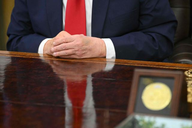 US President Donald Trump speaks after signing an executive order to drastically shrink two national monuments in Utah, paving the way for fossil fuel extraction and mining. (Photo by SAUL LOEB / AFP)