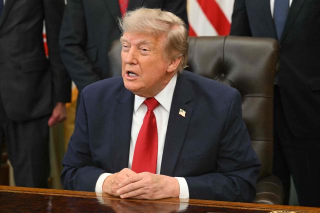 US President Donald Trump speaks after signing an executive order to drastically shrink two national monuments in Utah, paving the way for fossil fuel extraction and mining. (Photo by SAUL LOEB / AFP)