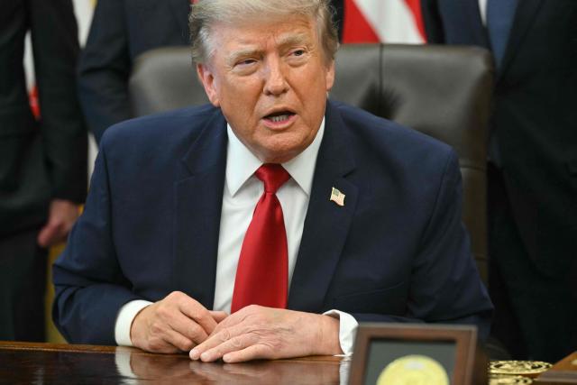 US President Donald Trump speaks after signing an executive order to drastically shrink two national monuments in Utah, paving the way for fossil fuel extraction and mining. (Photo by SAUL LOEB / AFP)