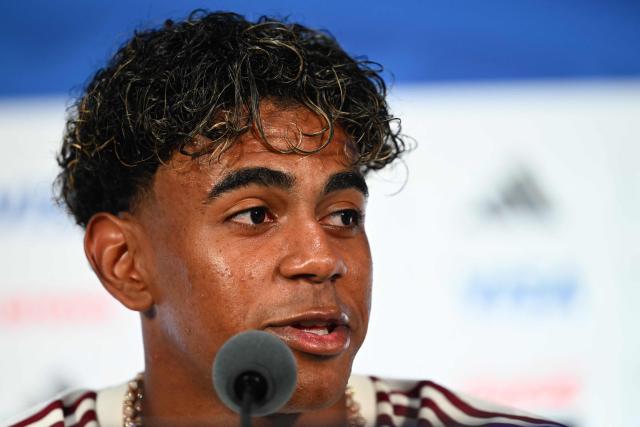 Spain's forward #19 Lamine Yamal gives an MD-1 press conference at the Dallas Stadium in Arlington on July 13, 2026, on the eve of the 2026 World Cup football tournament semi-final match between France and Spain. (Photo by MAURO PIMENTEL / AFP)