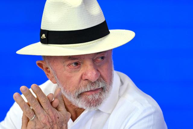 (FILES) Brazil’s President Luiz Inacio Lula Silva gestures during an event to announce a program to encourage debt repayment at Planalto Palace in Brasilia on June 29, 2026. Brazilian President Luiz Inacio Lula da Silva said on July 13, 2026, that plans by President Donald Trump to impose hefty fees on ships transiting the Strait of Hormuz would turn the United States into a "pirate" state. (Photo by Evaristo Sa / AFP)