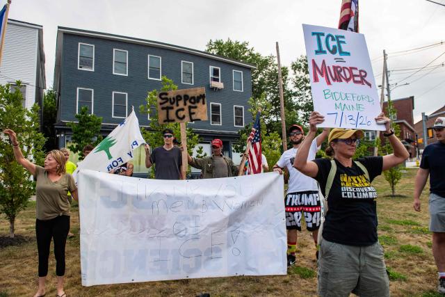 Supporters of ICE protest during a peaceful walking vigil honoring a 26-year-old Colombian man who was fatally shot during an Immigration and Customs Enforcement (ICE) operation in Biddeford, Maine, on July 13, 2026. A US immigration officer on July 13, fatally shot a man identified by rights groups as a 26-year-old Colombian, an incident likely to fuel criticism of President Donald Trump's deportation drive. The shooting happened in Biddeford, a town of 22,000 people in the northern state of Maine, and comes a week after an Immigration and Customs Enforcement (ICE) agent shot dead a Mexican man in Texas. (Photo by Joseph Prezioso / AFP)