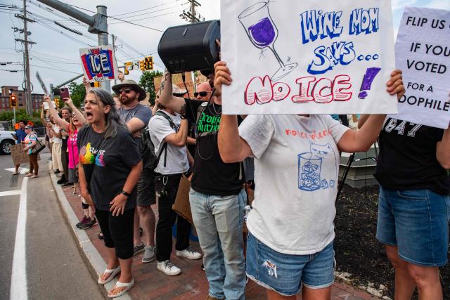 Demonstrators protest against ICE during a peaceful walking vigil honoring a 26-year-old Colombian man who was fatally shot during an Immigration and Customs Enforcement (ICE) operation in Biddeford, Maine, on July 13, 2026. A US immigration officer on July 13, fatally shot a man identified by rights groups as a 26-year-old Colombian, an incident likely to fuel criticism of President Donald Trump's deportation drive. The shooting happened in Biddeford, a town of 22,000 people in the northern state of Maine, and comes a week after an Immigration and Customs Enforcement (ICE) agent shot dead a Mexican man in Texas. (Photo by Joseph Prezioso / AFP)