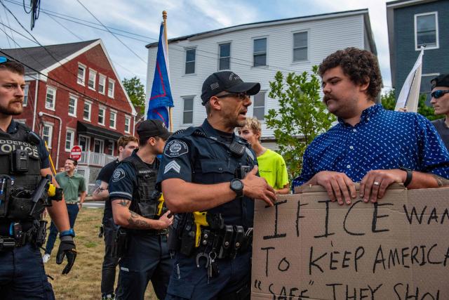 Police intervene as supporters of US President Donald Trump and of ICE gather at a vigil honoring a 26-year-old Colombian man who was fatally shot during an Immigration and Customs Enforcement (ICE) operation in Biddeford, Maine, on July 13, 2026. A US immigration officer on July 13, fatally shot a man identified by rights groups as a 26-year-old Colombian, an incident likely to fuel criticism of President Donald Trump's deportation drive. The shooting happened in Biddeford, a town of 22,000 people in the northern state of Maine, and comes a week after an Immigration and Customs Enforcement (ICE) agent shot dead a Mexican man in Texas. (Photo by Joseph Prezioso / AFP)