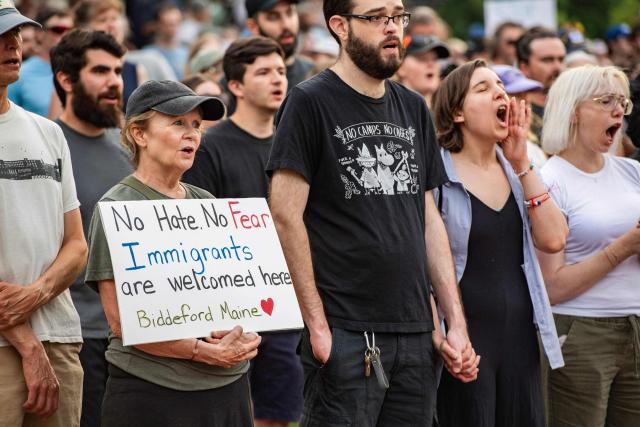 People participate in a peaceful walking vigil honoring a 26-year-old Colombian man who was fatally shot during an Immigration and Customs Enforcement (ICE) operation in Biddeford, Maine, on July 13, 2026. A US immigration officer on July 13, fatally shot a man identified by rights groups as a 26-year-old Colombian, an incident likely to fuel criticism of President Donald Trump's deportation drive. The shooting happened in Biddeford, a town of 22,000 people in the northern state of Maine, and comes a week after an Immigration and Customs Enforcement (ICE) agent shot dead a Mexican man in Texas. (Photo by Joseph Prezioso / AFP)