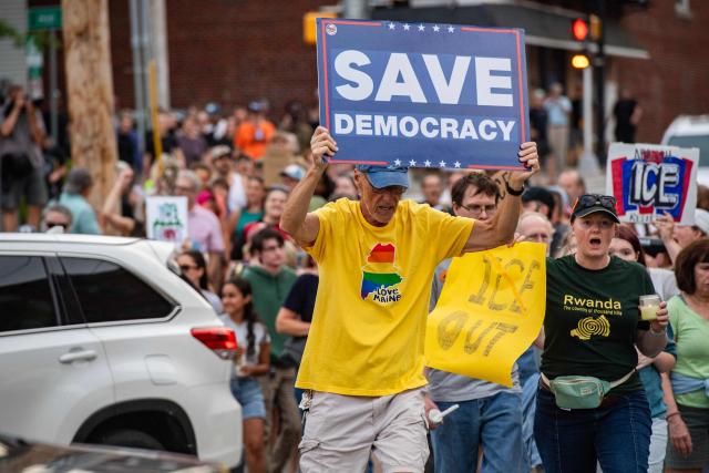 People participate in a peaceful walking vigil honoring a 26-year-old Colombian man who was fatally shot during an Immigration and Customs Enforcement (ICE) operation in Biddeford, Maine, on July 13, 2026. A US immigration officer on July 13, fatally shot a man identified by rights groups as a 26-year-old Colombian, an incident likely to fuel criticism of President Donald Trump's deportation drive. The shooting happened in Biddeford, a town of 22,000 people in the northern state of Maine, and comes a week after an Immigration and Customs Enforcement (ICE) agent shot dead a Mexican man in Texas. (Photo by Joseph Prezioso / AFP)