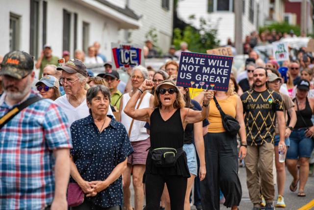 People participate in a peaceful walking vigil honoring a 26-year-old Colombian man who was fatally shot during an Immigration and Customs Enforcement (ICE) operation in Biddeford, Maine, on July 13, 2026. A US immigration officer on July 13, fatally shot a man identified by rights groups as a 26-year-old Colombian, an incident likely to fuel criticism of President Donald Trump's deportation drive. The shooting happened in Biddeford, a town of 22,000 people in the northern state of Maine, and comes a week after an Immigration and Customs Enforcement (ICE) agent shot dead a Mexican man in Texas. (Photo by Joseph Prezioso / AFP)