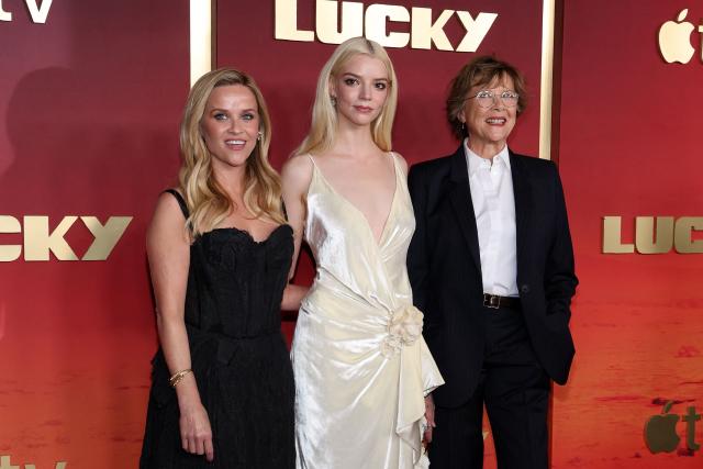 (L-R) US actress/executive producer Anya Taylor-Joy, US executive producer and actress  Reese Witherspoon and US actress Annette Bening attend Apple TV Limited Series premiere of "Lucky" at the Directors Guild of America in Los Angeles on July 13, 2026. (Photo by VALERIE MACON / AFP)