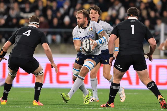 This picture taken on July 11, 2026 shows Italy's lock Niccolo Cannone (C) looking to offload the ball during the Nations Championship rugby Test match between New Zealand and Italy in Wellington. Niccolo Cannone was on July 14 banned for four matches after receiving a red card against New Zealand last weekend, meaning he will miss the Nations Championship clash with Australia. (Photo by Grant Down / AFP)