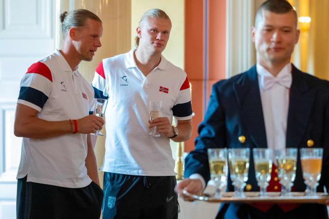 Norway's goalkeeper #01 Orjan Nyland (L) and Norway's forward #09 Erling Braut Haaland attend a reception with the Royal family at the palace in Oslo after their return to Norway from the USA on July 13, 2026. Norway were knocked out in the quarter-final match against England. (Photo by Amanda Pedersen Giske / NTB / AFP) / Norway OUT