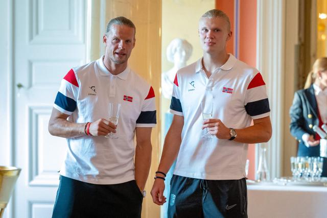 Norway's goalkeeper #01 Orjan Nyland (L) and Norway's forward #09 Erling Braut Haaland attend a reception with the Royal family at the palace in Oslo after their return to Norway from the USA on July 13, 2026. Norway were knocked out in the quarter-final match against England. (Photo by Amanda Pedersen Giske / NTB / AFP) / Norway OUT
