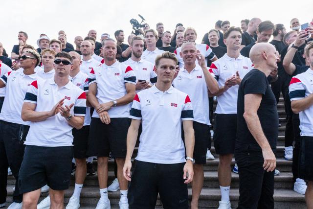 Norway's national football team celebrate with the audience at Slottsplassen in Oslo after their return to Norway from the USA on July 13, 2026. Norway were knocked out in the quarter-final match against England. (Photo by Trond Reidar TEIGEN / NTB / AFP) / Norway OUT