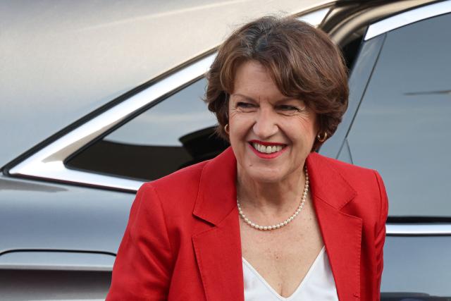 France's Agriculture Minister Annie Genevard arrives for the annual Bastille Day military parade on the Champs-Elysees Avenue in Paris on July 14, 2026. (Photo by Ludovic MARIN / AFP)