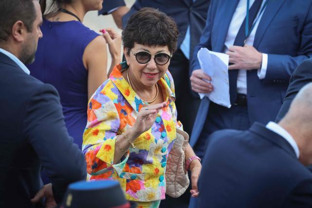 France's Environment Minister Monique Barbut arrives for the annual Bastille Day military parade on the Champs-Elysees Avenue in Paris on July 14, 2026. (Photo by Ludovic MARIN / AFP)