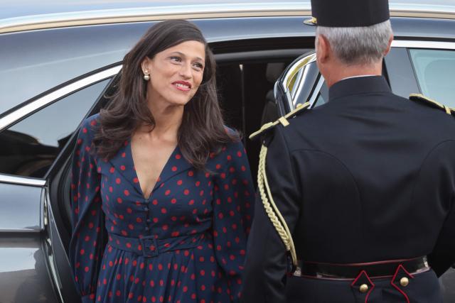 France's junior Minister in charge of global Francophones and expatriates Eleonore Caroit arrive for the annual Bastille Day military parade on the Champs-Elysees Avenue in Paris on July 14, 2026. (Photo by Ludovic MARIN / AFP)