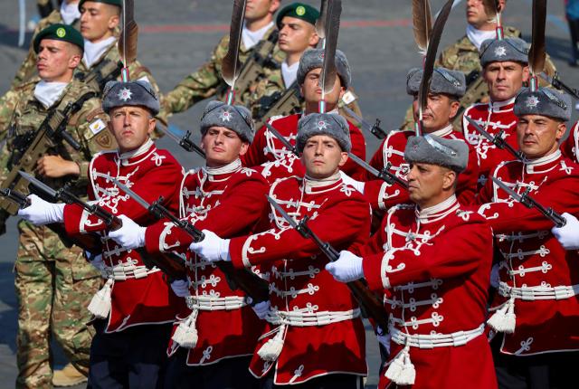 Bulgarian troops parade with the Coalition of volunteers of invited foreign nations during the annual Bastille Day military parade on the Champs-Elysees Avenue in Paris on July 14, 2026. (Photo by Ludovic MARIN / AFP)