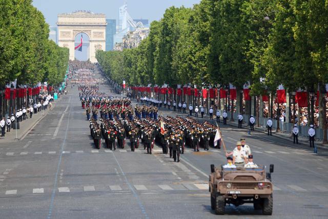 French army troops parade during the annual Bastille Day military parade on the Champs-Elysees Avenue in Paris on July 14, 2026. (Photo by Ludovic MARIN / AFP)