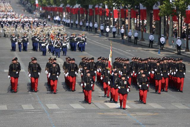 Members of French Armed Forces Health School parade during the annual Bastille Day military parade on the Champs-Elysees Avenue in Paris on July 14, 2026. (Photo by Ludovic MARIN / AFP)