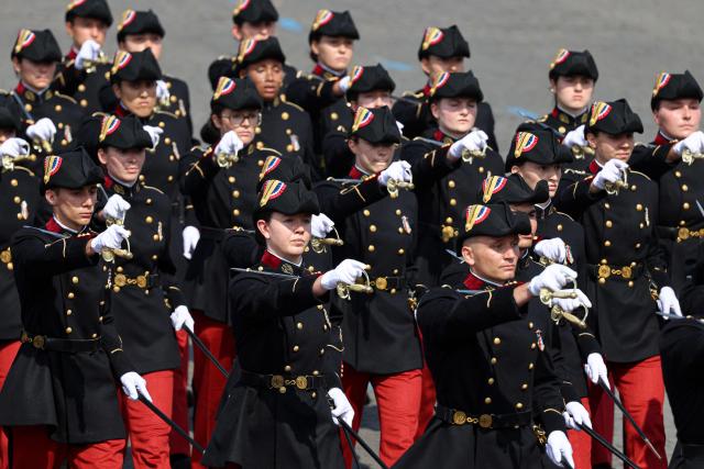 Members of French Armed Forces Health School parade during the annual Bastille Day military parade on the Champs-Elysees Avenue in Paris on July 14, 2026. (Photo by Ludovic MARIN / AFP)