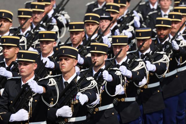 Members of Montluçon Gendarmerie School parade during the annual Bastille Day military parade on the Champs-Elysees Avenue in Paris on July 14, 2026. (Photo by Ludovic MARIN / AFP)