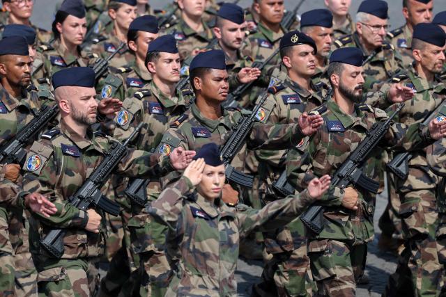 French soldiers of the 942 Mont Verdun Air Base parade during the annual Bastille Day military parade on the Champs-Elysees Avenue in Paris on July 14, 2026. (Photo by Ludovic MARIN / AFP)