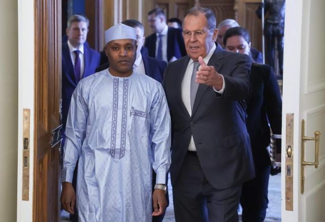 Russian Foreign Minister Sergei Lavrov and Chadian Foreign Minister Abdoulaye Sabre Fadoul enter a hall during a meeting in Moscow on July 14, 2026. (Photo by SERGEI ILNITSKY / POOL / AFP)
