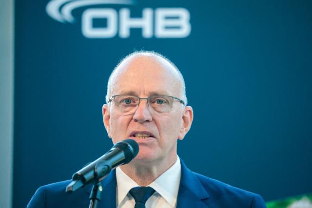 Marco Fuchs, CEO of the OHB group, speaks during a press briefing at the headquarters of German aerospace and technology company OHB in Bremen, northwestern Germany, on July 14, 2026. According to the group, it covers "the entire spectrum of modern space technologies", with activities ranging "from the development of complete satellite systems and space missions to infrastructure for access to space, as well as data-driven applications and digital services". (Photo by FOCKE STRANGMANN / AFP)
