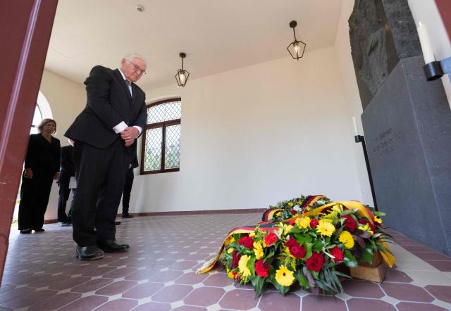 German President Frank-Walter Steinmeier lays a wreath on July 14, 2026 at the cemetery chapel in Ahrweiler, western Germany, to commemorate the victims of the dramatic floods from July 2021. More than 180 people lost their lives five years ago in severe floods that pummelled western Germany in mid-July 2021, raising questions about whether enough was done to forewarn residents. (Photo by Boris Roessler / POOL / AFP)