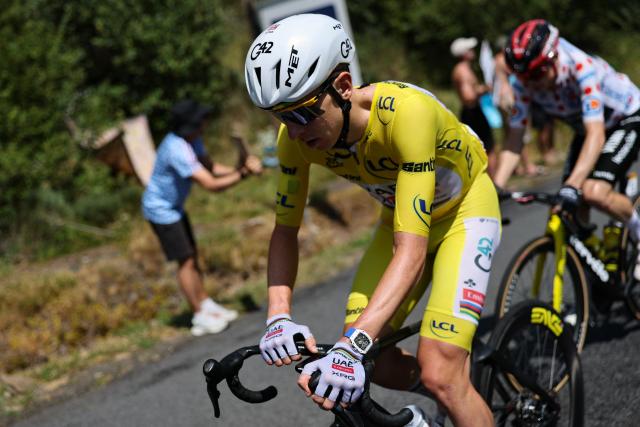 UAE Team Emirates - XRG's Slovenian rider Tadej Pogacar wearing the overall leader's yellow jersey cycles during the 10th stage of the 113th edition of the Tour de France cycling race, 166,6 km between Aurillac and Le Lioran in the Massif Central, on July 14, 2026. (Photo by Anne-Christine POUJOULAT / AFP)