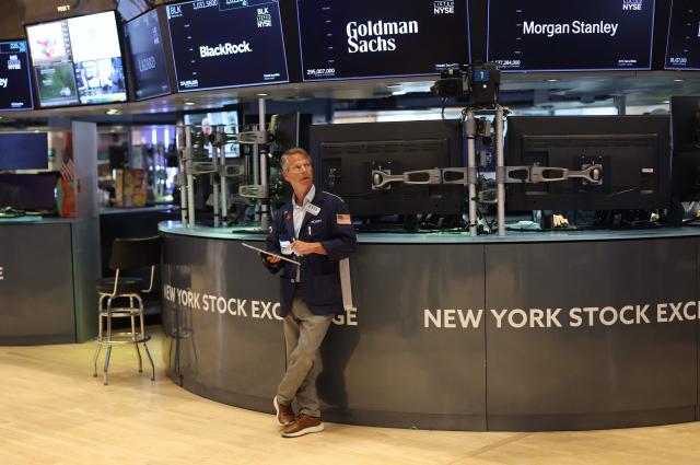 A trader works on the floor of the New York Stock Exchange (NYSE) in New York on July 14, 2026. (Photo by TIMOTHY A. CLARY / AFP)