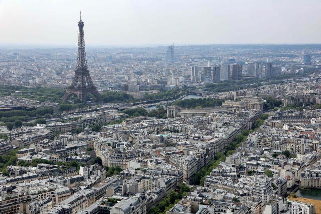This aerial photograph taken on July 14, 2026, shows the Eiffel Tower in Paris. (Photo by Thomas SAMSON / AFP)