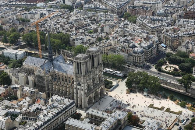 This aerial photograph taken on July 14, 2026, shows Notre-Dame de Paris Cathedral. (Photo by Thomas SAMSON / AFP)
