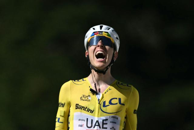 UAE Team Emirates - XRG's Slovenian rider Tadej Pogacar cycles to the finish line to win the 10th stage of the 113th edition of the Tour de France cycling race, 166,6 km between Aurillac and Le Lioran in the Massif Central, on July 14, 2026. (Photo by Jeff PACHOUD / AFP)