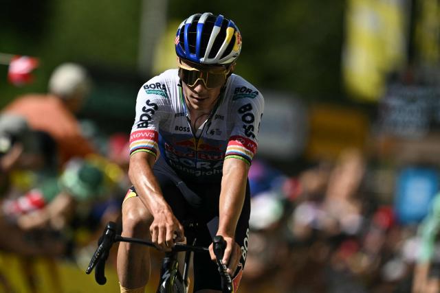 Red Bull - BORA - hansgrohe team's Belgian rider Remco Evenepoel cycles to the finish line to take second place in the 10th stage of the 113th edition of the Tour de France cycling race, 166,6 km between Aurillac and Le Lioran in the Massif Central, on July 14, 2026. (Photo by Jeff PACHOUD / AFP)