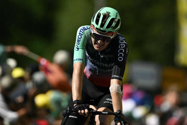 Decathlon CMA CGM Team's French rider Paul Seixas cycles to the finish line to take third place in the 10th stage of the 113th edition of the Tour de France cycling race, 166,6 km between Aurillac and Le Lioran in the Massif Central, on July 14, 2026. (Photo by Jeff PACHOUD / AFP)