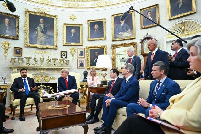 US President Donald Trump meets with Prime Minister of Iraq Ali al-Zaidi (L) in the Oval Office of the White House in Washington, DC, on July 14, 2026. Also pictured, US Secretary of State Marco Rubio (4L) US Secretary of Treasury Scott Bassent (3R) US Secretary of Defense Pete Hegseth (2R) and White House Chief of Staff Susie Wiles (R). (Photo by SAUL LOEB / AFP)