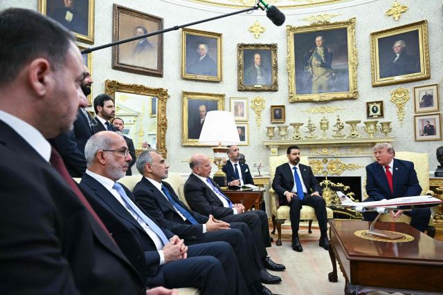 US President Donald Trump meets with Prime Minister of Iraq Ali al-Zaidi (L) in the Oval Office of the White House in Washington, DC, on July 14, 2026. (Photo by SAUL LOEB / AFP)
