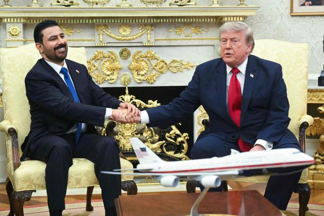 US President Donald Trump shakes hands with Prime Minister of Iraq Ali al-Zaidi (L) in the Oval Office of the White House in Washington, DC, on July 14, 2026. (Photo by SAUL LOEB / AFP)