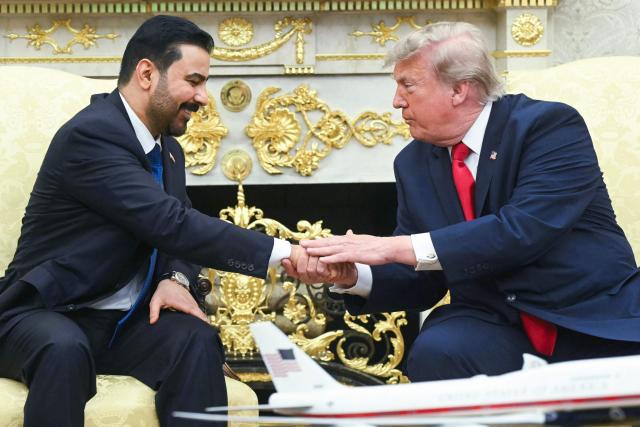 US President Donald Trump shakes hands with Prime Minister of Iraq Ali al-Zaidi (L) in the Oval Office of the White House in Washington, DC, on July 14, 2026. (Photo by SAUL LOEB / AFP)