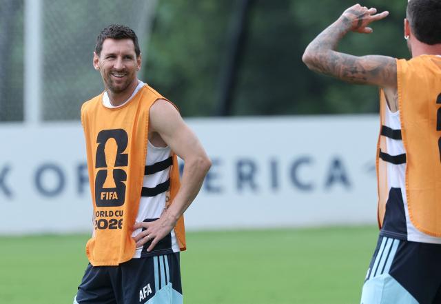 Argentina's forward #10 Lionel Messi smiles with teammates during a training session on the eve of the 2026 World Cup football tournament semi-final match between England and Argentina, at Atlanta United Training Centre in Atlanta on July 14, 2026.  (Photo by Thomas COEX / AFP)
