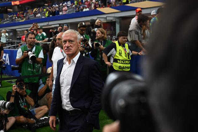 France's head coach Didier Deschamps arrives for the 2026 World Cup football tournament semi-final match between France and Spain at the Dallas Stadium in Arlington on July 14, 2026.  (Photo by Paul ELLIS / AFP)