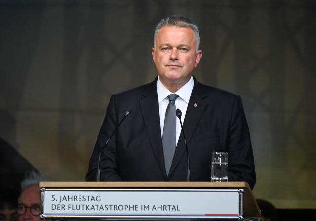 Rhineland-Palatinate's State Premier Gordon Schnieder speaks at a memorial event on July 14, 2026 in Ahrweiler, western Germany, to commemorate the victims of the dramatic floods from July 2021. More than 180 people lost their lives five years ago in severe floods that pummelled western Germany in mid-July 2021, raising questions about whether enough was done to forewarn residents. (Photo by INA FASSBENDER / AFP)