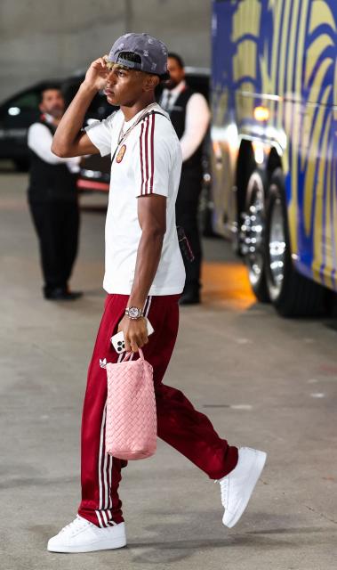 Spain's forward #19 Lamine Yamal arrives for the 2026 World Cup football tournament semi-final match between France and Spain at the Dallas Stadium in Arlington on July 14, 2026.  (Photo by FRANCK FIFE / AFP)