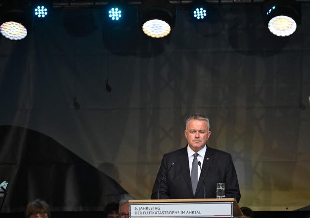 Rhineland-Palatinate's State Premier Gordon Schnieder speaks at a memorial event on July 14, 2026 in Ahrweiler, western Germany, to commemorate the victims of the dramatic floods from July 2021. More than 180 people lost their lives five years ago in severe floods that pummelled western Germany in mid-July 2021, raising questions about whether enough was done to forewarn residents. (Photo by INA FASSBENDER / AFP)