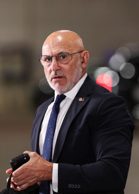 Spain's head coach Luis de la Fuente arrives for the 2026 World Cup football tournament semi-final match between France and Spain at the Dallas Stadium in Arlington on July 14, 2026.  (Photo by FRANCK FIFE / AFP)