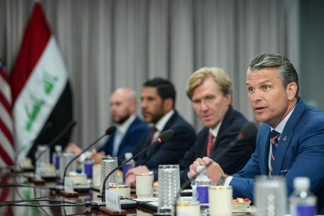 US Defense Secretary Pete Hegseth (R) speaks during a meeting with Iraqi Prime Minister Ali al-Zaidi (not pictured) at the Pentagon in Washington, DC, on July 14, 2026. (Photo by Alexander Drago / POOL / AFP)